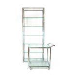 Industrial Design: a chromed and glazed six-tier shelf together with a matching two tier trolley,