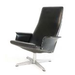 A 1970's black highback armchair on a four-star swivel base CONDITION REPORT: Wear