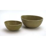 Gunnar Nylund for Rorstrand Ritzi, a graduated pair of pale green bowls, max. w.