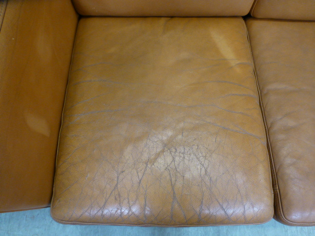 A 1970's tan leather three seater sofa on beech legs, - Image 6 of 13