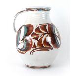 Edgar Camden for Aldermaston, a studio pottery jug decorated with autumnal glazed on a ridged body,