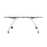 Sir Norman Foster for Tecno, a 'Nomos' rectangular table with a glass top, on castors, l.