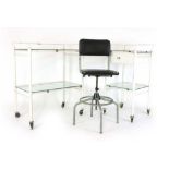 Industrial Design: a pair of medical white tole and glazed trolleys,