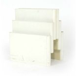 Giotto Stoppino for Kartell, a No. 4675 cream plastic Italian magazine rack, h.