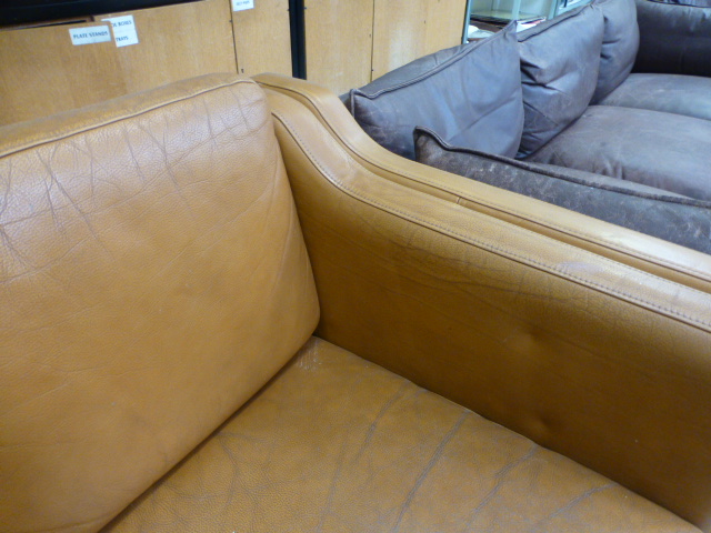 A 1970's tan leather three seater sofa on beech legs, - Image 2 of 13