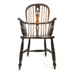 A 19th century elm and ash Windsor chair with a shaped and pierced splat, turned arm supports,