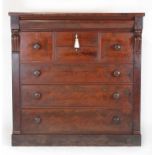A 19th century mahogany chest of drawers, the top over a cushion fronted secret drawer,