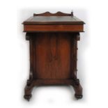 A Victorian rosewood piano top davenport,