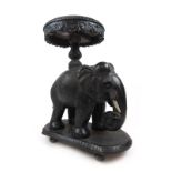 A late 19th century Indian ebonised stand,