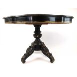 A 19th century and later ebonised, parcel gilt and painted French centre table,