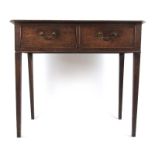 A mid 18th century oak two drawer side table, the moulded top on square section tapering legs, h.