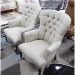 ARMCHAIRS, a pair, cream linen upholstery, buttoned back on turned supports.