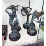 FOUR MUSICIANS, on marble base.