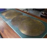 BRONZE TRAYS, a set of four, circular, 50cm diam.