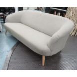 DESIGNERS GUILD SOFA, with oatmeal upholstery on short tapered wooden supports, 198cm L x 75cm H.