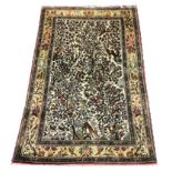 TREE OF LIFE DESIGN QUM SILK RUG, 160cm x 104cm, all over design with a complimentary border.