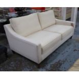 SOFA, cream, with woven fabric to back and sides, 100cm x 95cm H x 176cm L.