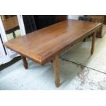 DINING TABLE, Asian teak with a carved apron and shaped fluted supports,