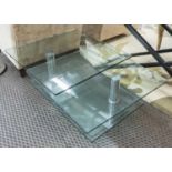 ARTICULATING TABLE, in glass with glass under shelf on chromed metal supports, 99cm x 70cm x 39cm H.