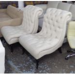 EASY CHAIRS, a pair, in neutral buttoned fabric on turned castor supports, 69cm W.