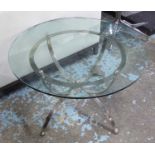 LOW TABLE, circular top on hammered silvered base, approx 71cm D.