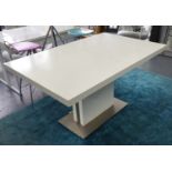 CONTEMPORARY EXTENDING DINING TABLE, in white lacquered finish.