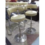 BAR STOOLS, a set of five, swivel cream leather, 53cm x 108cm H.