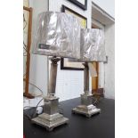 LAMPS, a pair, silvered metal, fluted column with plinth support.
