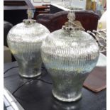 LAMPS, a pair, baluster form distressed silvered ribbed glass, 40cm H.
