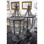 STORM LANTERNS, a pair, with five hanging night lights inside a glass and metal frame, 75cm H.