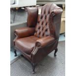 WING ARMCHAIR, Georgian style in buttoned brown leather, 83cm W.