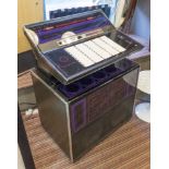 ROCK-OLA JUKEBOX, model 453, circa 1975, comes with a selection of vinyls, 97cm x 60cm x 118cm,