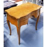 DESK / DRESSING TABLE, with a shaped top, five drawers and gilt mounts, 78cm W x 79cm H x 49cm D.