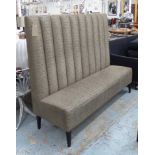 BANQUETTE, in ribbed brown flecked fabric on square ebonised supports, 170cm L.