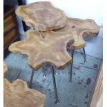 TRIO OF NESTING TABLES, tree root tops on triform metal bases, tallest 46cm H.