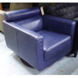 NATUZZI ARMCHAIR, in navy blue leather, 76cm x 80cm H x 81cm.