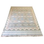 DHURRIE RUG, 241cm x 169cm, geometric field in pastel colours.