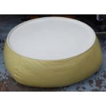 B & B ITALIA LOW TABLE, circular on a leather pouffe base, 92cm diam. x 30cm H.