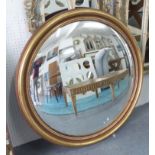 BUTLERS MIRROR, of large proportions in a gilded frame, 100cm dia.