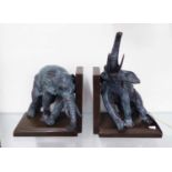 BOOKENDS, a pair of elephants, in bronze verdigris finish, 27cm L.