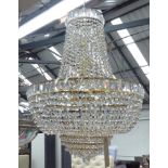 BAG CHANDELIER, with faceted cut glass, cascading chains and drops on a brass frame,