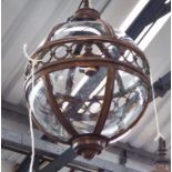 HANGING LAMP, in globe form in a bronze effect frame, 66cm H plus chain.