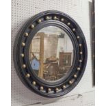 WALL MIRROR, circular Regency style ebonised with gilt ball detail, 71cm W.