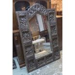 WALL MIRROR, inlaid with a carved wooden frame, 87cm W x 134cm H.