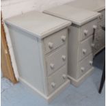 BEDSIDE CHESTS, a pair, with three drawers with knob handles,