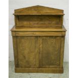 CHIFFONIER, early Victorian mahogany with triangular shelved back above two doors,