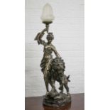 FIGURAL LAMP, bronzed finish modelled as a lion and female with glass shade, 95cm H x 31cm.