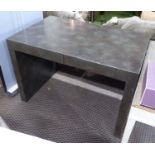 WRITING TABLE, contemporary, in faux metal finish with two drawers below on end supports,