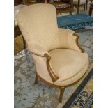 BERGERES, a pair, early 20th century French walnut veneered and woven cotton upholstered.