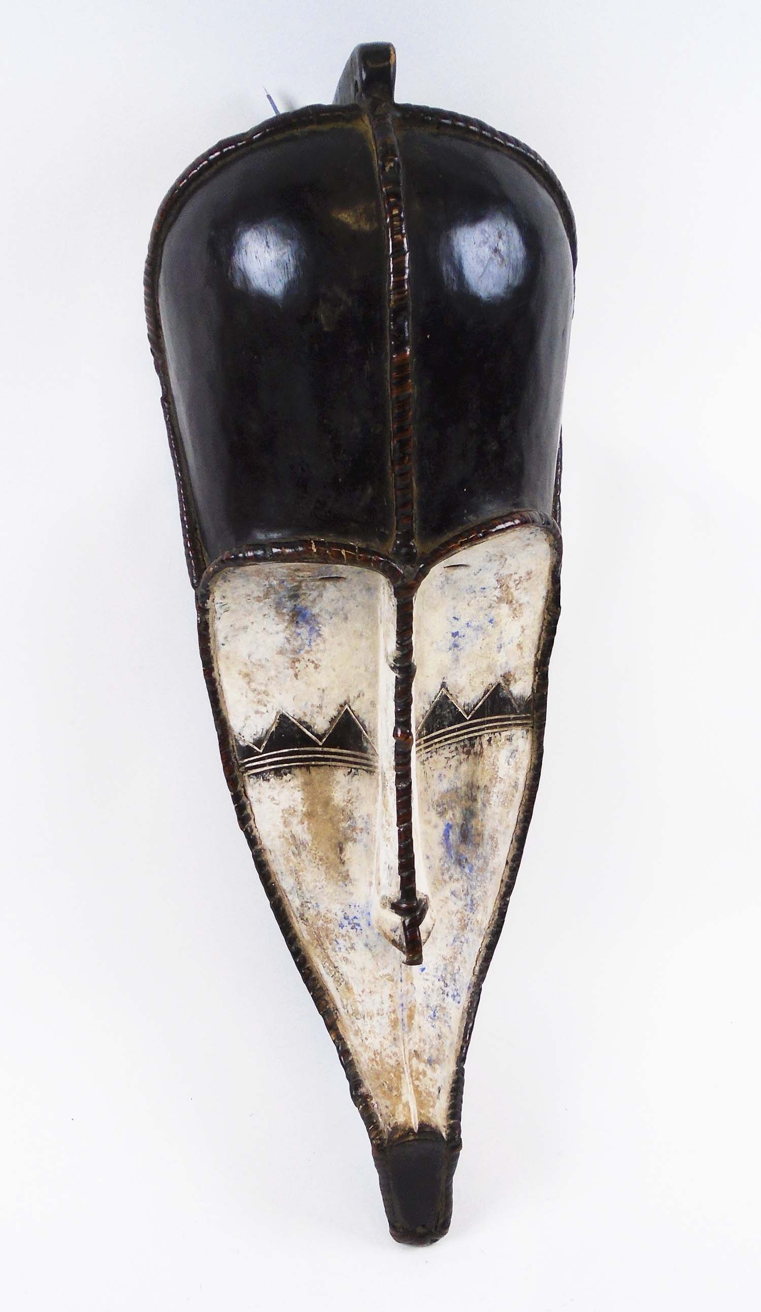 FANG FACE MASK, Gabon carved and whitened wood, approx 69cm H x 24cm max.